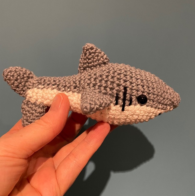 MulKay's make photo for Baby shark keychain crochet pattern. Mini fish toy.