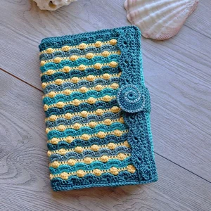 click to see Sunlit Depths Book Cover Crochet Pattern