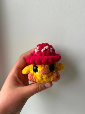 Mini chick in a mushroom hat