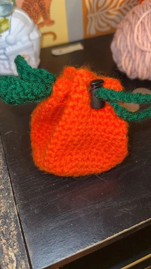 Orange draw string bag