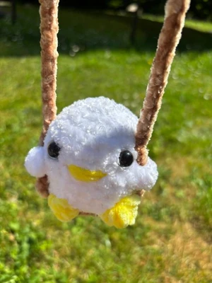 Cute crochet duck on a swing!