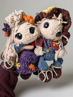 Mr. Hank &  Harriet Straw, the floppy scarecrows