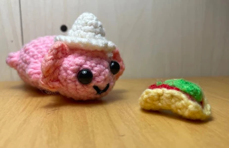 No-sew mini axolotl with Mexican accessories including a sombrero and a taco