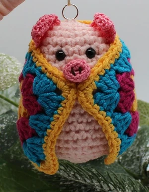 Pig in a granny square blanket
