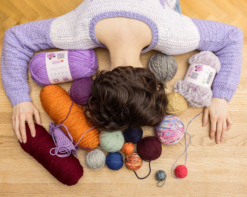 Beginner knitting project with needles and yarn